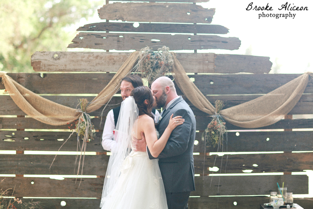 bride and groom first kiss, brooke aliceon photography, ramona wedding ceremony locations