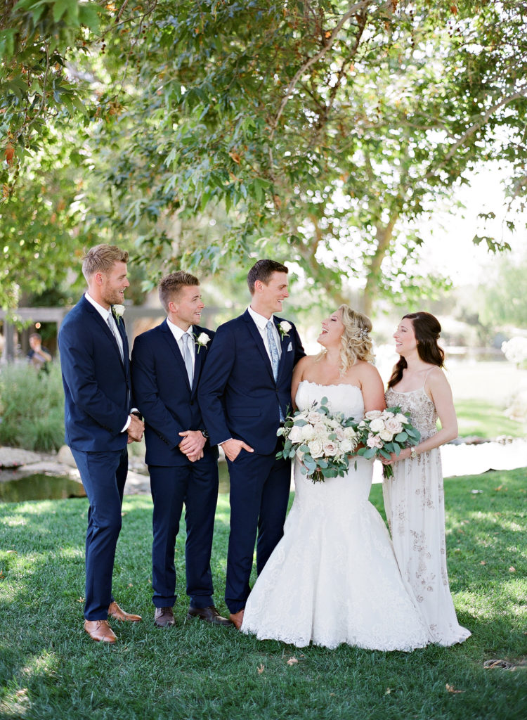 bridal party wearing navy and blush