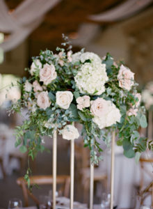 white and pink floral centerpieces
